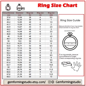 May include: Ring size chart with measurements in millimeters and inches. The chart shows the circumference and diameter of rings in millimeters, and the corresponding ring size in EU, UK, and USA sizing. The chart also includes a guide on how to measure your ring size.