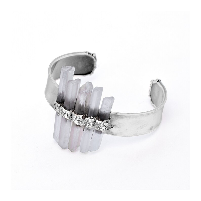 May include: A silver cuff bracelet featuring a cluster of light purple and white crystal points. The crystals are set in a row of small silver beads.