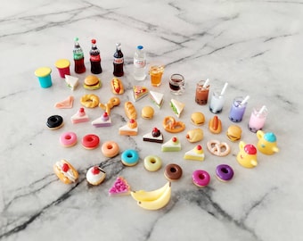 May include: A collection of miniature food and drink items, including miniature bottles of soda, miniature cakes, miniature sandwiches, miniature pretzels, miniature donuts, miniature cups of boba tea, and miniature fruit.