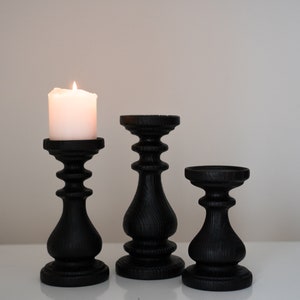 Cool black candle holders set 3 Rustic candle sticks Three wooden decor Centerpiece Turned wood pillars Black wood home design Magic cool