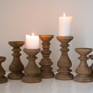 Beautiful wood color candle holders set of 7 candlesticks Seven wooden pillars Turned wood warmhouse design Magic cool decor Farmhouse decor
