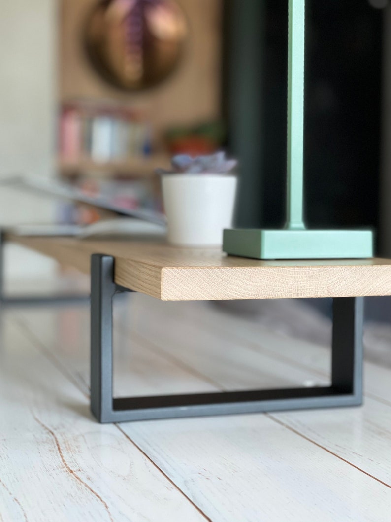 Wooden desktop monitor raised stand and home office desk riser, perfect as a computer stand and essential work-from-home desk accessory for organizing and elevating your workspace.
