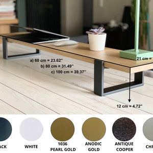 Wooden desktop monitor raised stand and home office desk riser, perfect as a computer stand and essential work-from-home desk accessory for organizing and elevating your workspace.