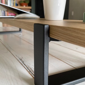Wooden desktop monitor raised stand and home office desk riser, perfect as a computer stand and essential work-from-home desk accessory for organizing and elevating your workspace.