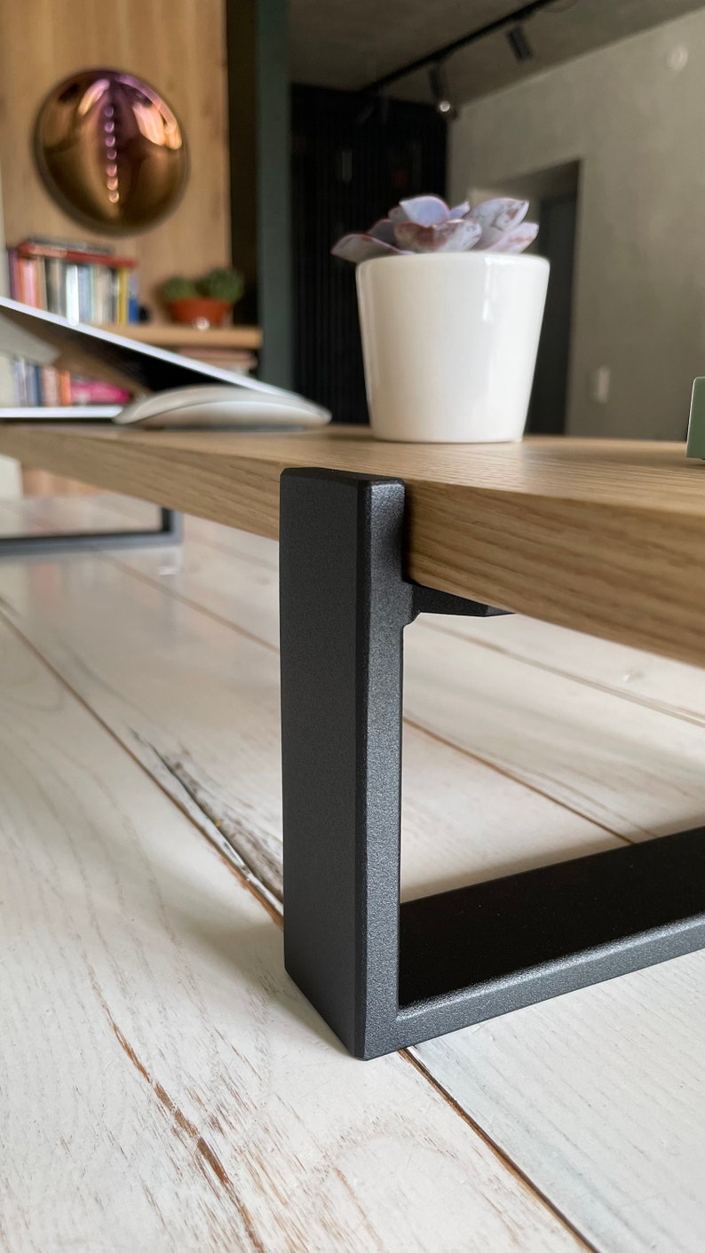 Wooden desktop monitor raised stand and home office desk riser, perfect as a computer stand and essential work-from-home desk accessory for organizing and elevating your workspace.