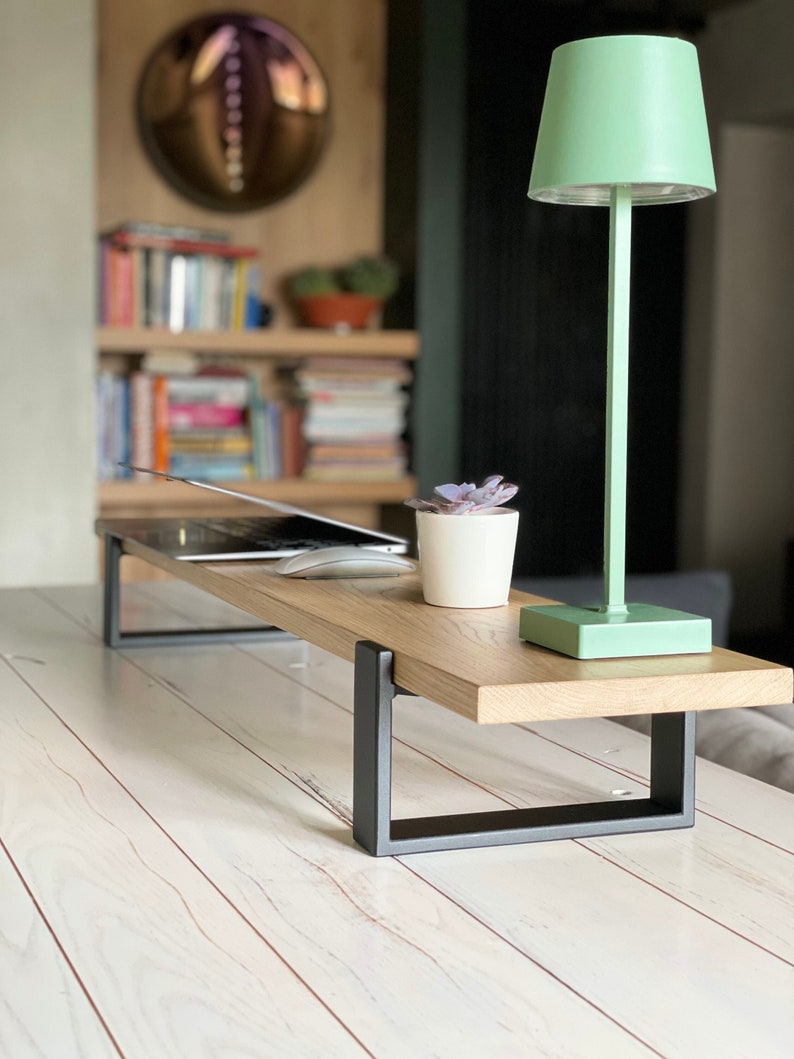 Wooden desktop monitor raised stand and home office desk riser, perfect as a computer stand and essential work-from-home desk accessory for organizing and elevating your workspace.