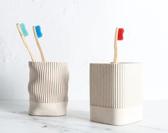 Minimal concrete toothbrush holder, two styles and multiple concrete colours available. Perfect minimal bathroom decor