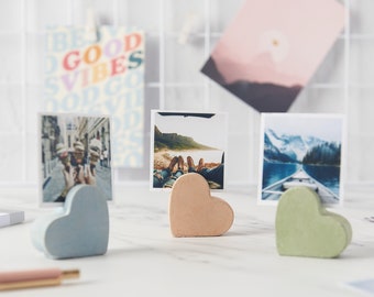 Heart shaped concrete photo or name card holders, Ideal for holding Wedding name cards. Several colours available, great for gifting