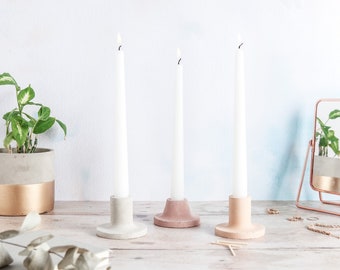 Minimal Concrete Candle Stick Holders, available in multiple colours and two sizes. Perfect for a wide range of candlesticks