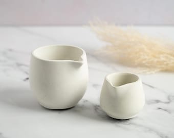 Large and Small Fluted Concrete Decorative Jugs - Sleek Round Design