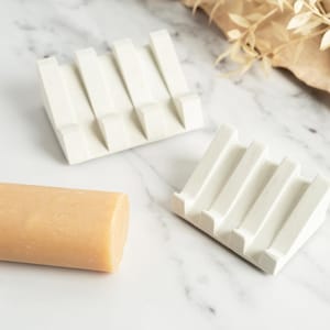 Draining geometric concrete soap dish, available in multiple concrete colours