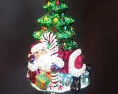 Christopher Radko Santa in Tree-pose Ornament