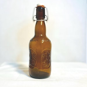 Vintage beer bottle, amber brown, Grolsch swing top lager bottle, Proclein Cap "Grolsch  Georgia"