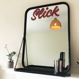 Slick vintage style metal hand sign written mirror image 1