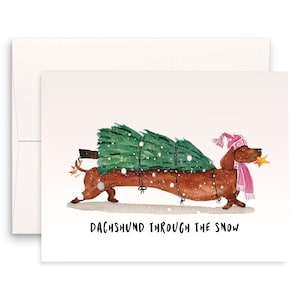 Carte de Noël teckel – Se précipitant dans la neige, cadeaux pour les amoureux des chiens