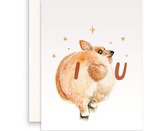 May include: A white card with a watercolour illustration of a corgi's rear end with the words "I U" written in brown text.