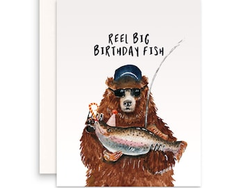 May include: A watercolor illustration of a brown bear wearing sunglasses and a blue baseball cap holding a trout with a birthday hat on. The text "Reel Big Birthday Fish" is above the bear.