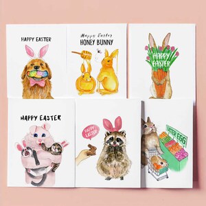 May include: Six illustrated cards with a Happy Easter theme. Each card features a different animal wearing bunny ears and holding Easter-themed items. The animals include a dog, a bunny, a raccoon, a pig, and a cat. The cards are all white with black text.