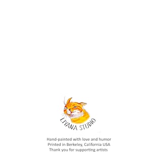 May include: A hand-painted illustration of a cat with a winking expression. The illustration is surrounded by the text "LIYANA STUDIO" and includes the text "Hand-painted with love and humor", "Printed in Berkeley, California USA", "Thank you for supporting artists", and "@LiyanaStudio".