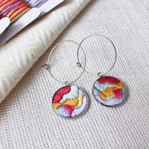 Handmade hoop earrings with colorful embroidered pendant, hand-embroidered unique statement jewelry design, abstract and modern embroidery image 1