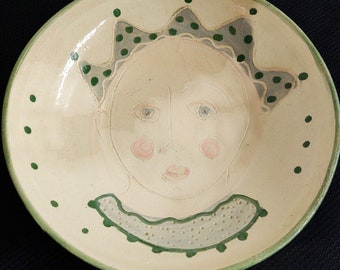 Vtg. jester incised design pottery bowl; hand made, large.