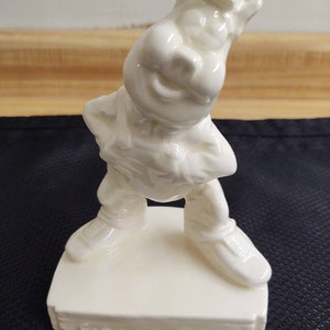 Vintage Farmer Bill ceramic pig advertisement figurine.