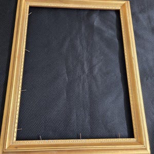 Vtg. large gold leaf multi tiered wood frame.