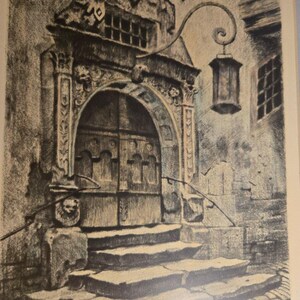 May include: A black and white drawing of a stone doorway with a lantern hanging above it. The doorway has a carved archway and a set of steps leading up to it. The lantern is hanging from a wrought iron arm.
