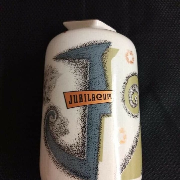 Vintage Jubilaeum ceramic bottle with funky graphics.