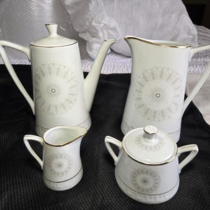MCM Wawel, Poland china teapot, sugar, creamer and water pitcher.
