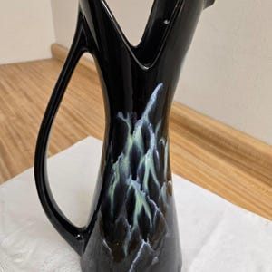 Vtg. MCM Royal Haeger pitcher vase: black with drip glaze.