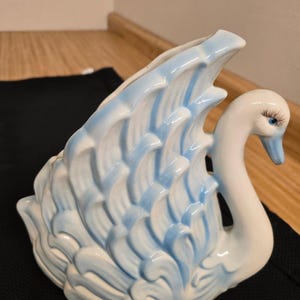 Vtg. ceramic swan planter w/fused blues and whites.