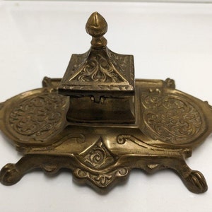 Vtg. brass inkwell.