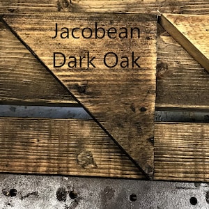 May include: Three triangular wood samples showing different wood finishes: Clear Wax Finish, Jacobean Dark Oak, and Natural Danish Oil.