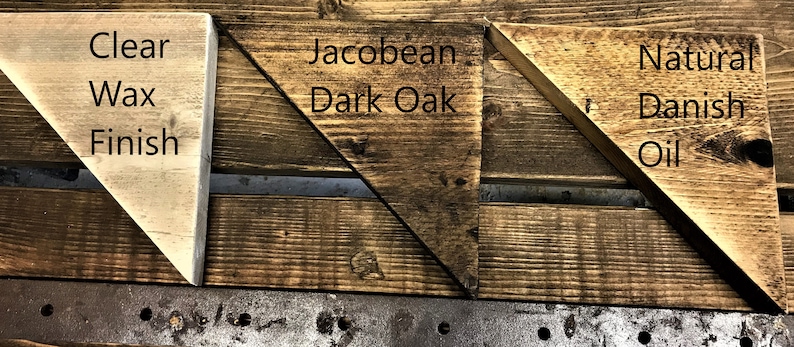 May include: Three triangular wood samples showing different wood finishes: Clear Wax Finish, Jacobean Dark Oak, and Natural Danish Oil.