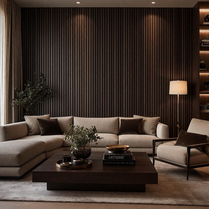 May include: A modern living room with a sectional sofa, armchair, and a dark wood coffee table. The room features a dark wood paneled wall, a floor lamp, and decorative items. The color palette includes neutral tones and dark wood accents.