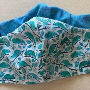 Green chameleon face mask. Reversible double layered cotton fabric.