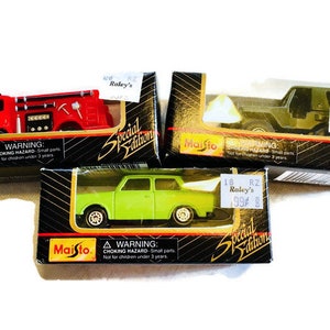 3 in total Maisto Special Edition collectors vehicles Product No. 11001 All new in box.