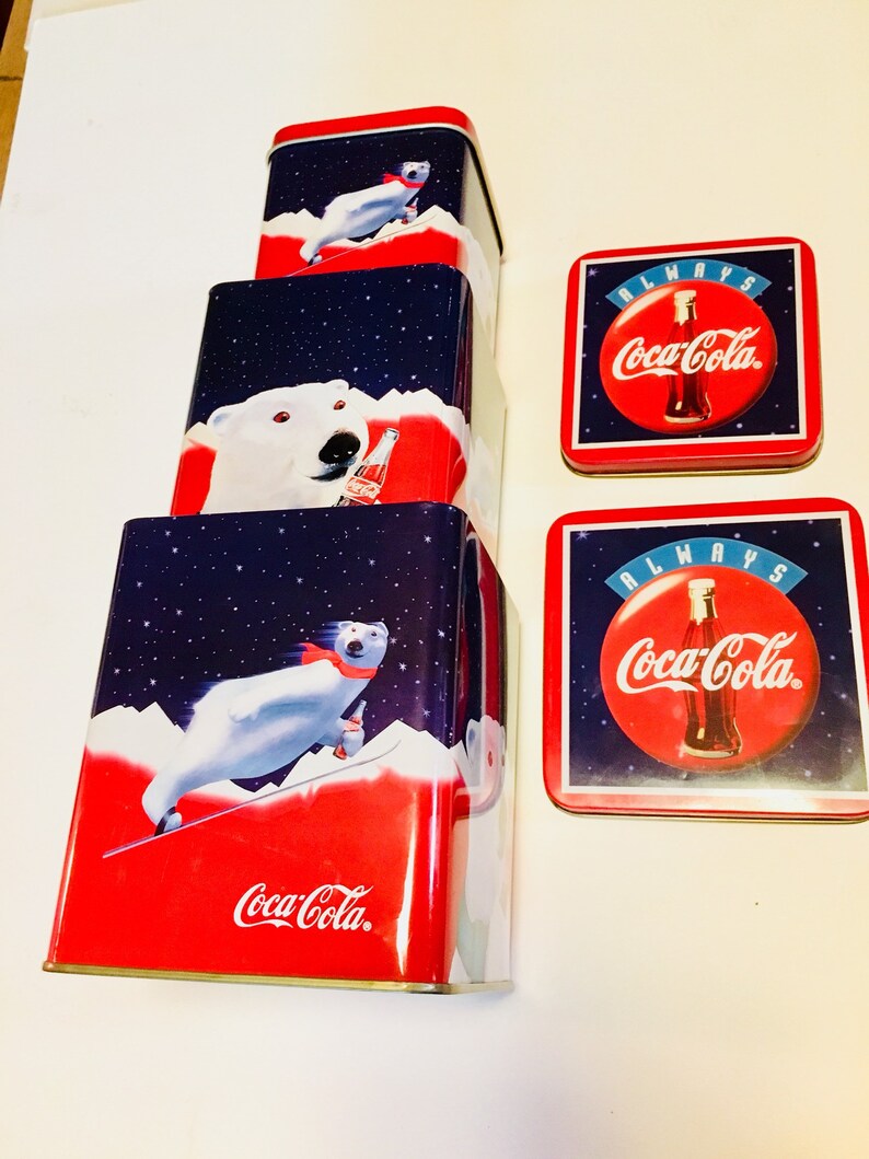 3 different size tins all stack together inside the large tin. 1994 Winter Polar Bear Coca Cola Tin Vintage Coca Cola Brand Tins