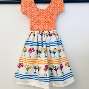Vibrant Floral Geometric Kitchen Towel Dress – Celebrate Summer Together!