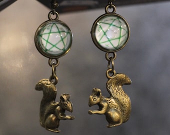 Supernatural inspired earrings:  With Devils Trap and Squirrel.
