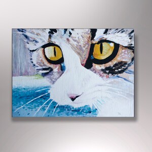 May include: A close-up painting of a cat's face. The cat has white fur with brown and black markings. The cat's eyes are bright yellow and the painting is done in a realistic style.