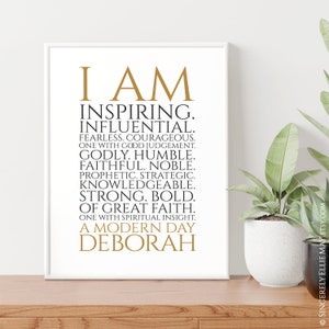 Peut inclure: Une affiche imprimable avec un texte dor&eacute; sur fond blanc. Le texte dit "I AM INSPIRING. INFLUENTIAL. FEARLESS. COURAGEOUS. ONE WITH GOOD JUDGEMENT. GODLY. HUMBLE. FAITHFUL. NOBLE. PROPHETIC. STRATEGIC. KNOWLEDGEABLE. STRONG. BOLD. OF GREAT FAITH. ONE WITH SPIRITUAL INSIGHT. A MODERN DAY DEBORAH."