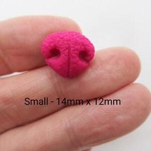 May include: A small, bright pink, plastic nose with two holes. The nose is 14mm x 12mm.
