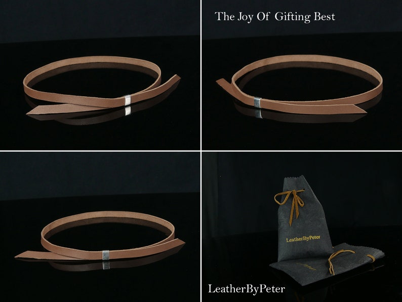 May include: A brown leather strap with a silver buckle. The strap is tied in a bow and is displayed on a black surface. The strap is packaged in a grey drawstring bag with the text "LeatherByPeter" printed on it.