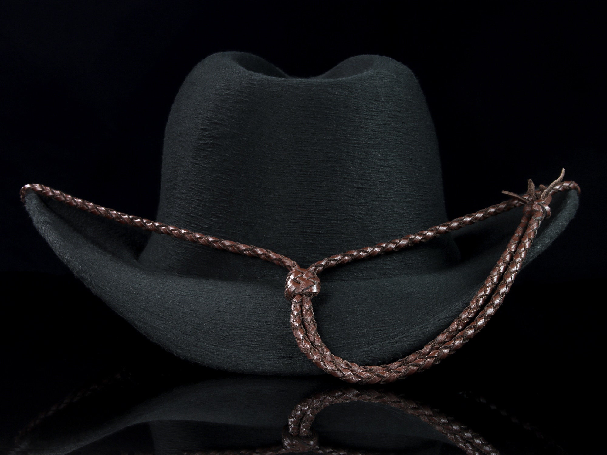 Brown custom hand-braided leather stampede strings for hat