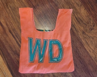 Orange netball bib bag with green lettering - reversible - unique gift netball fans, gift for mum, gift for coach - zero waste, reusable bag