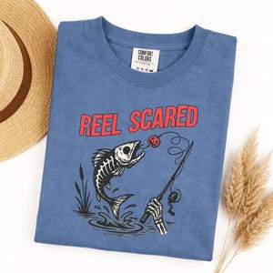Comfort Colors Reel Scared T-Shirt, Spooky Fishing Halloween Shirt, Skeleton Fish Angler Tee, Funny Horror Fishing Gift, Vintage Pumpkin