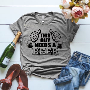 This Guy Needs A Beer T Shirt, Gifts For Dad, Gifts for Beer Lover, Awesome Summer Shirt, Beer Drinking Shirt, Alcohol Gifts, Funny T-Shirts
