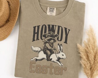 Comfort Colors Howdy Easter T-Shirt, Retro Cowboy Raccoon Riding Bunny, Funny Western Country Tee, Vintage Easter Gift